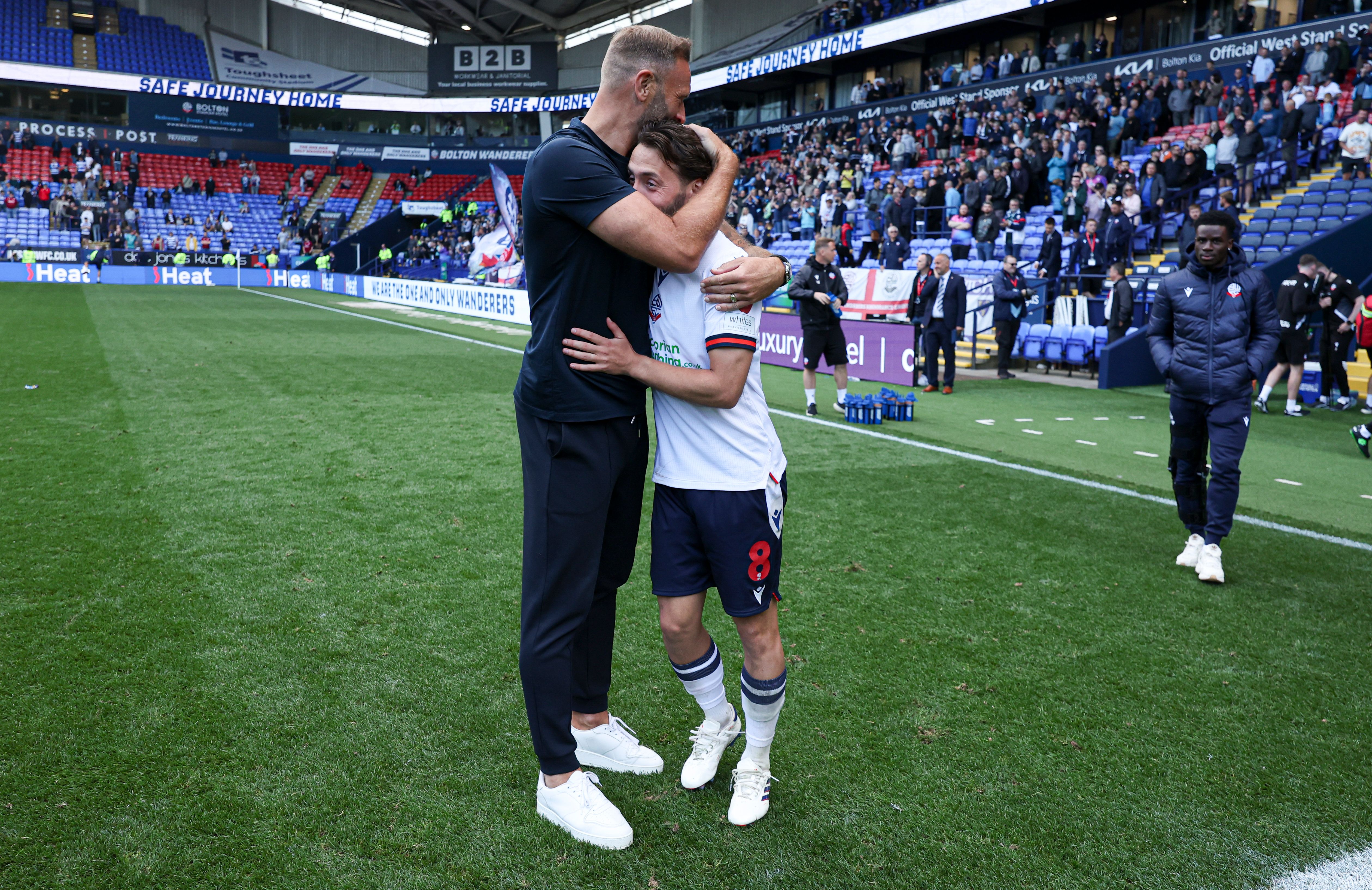 Josh Sheehan Ian Evatt embrace