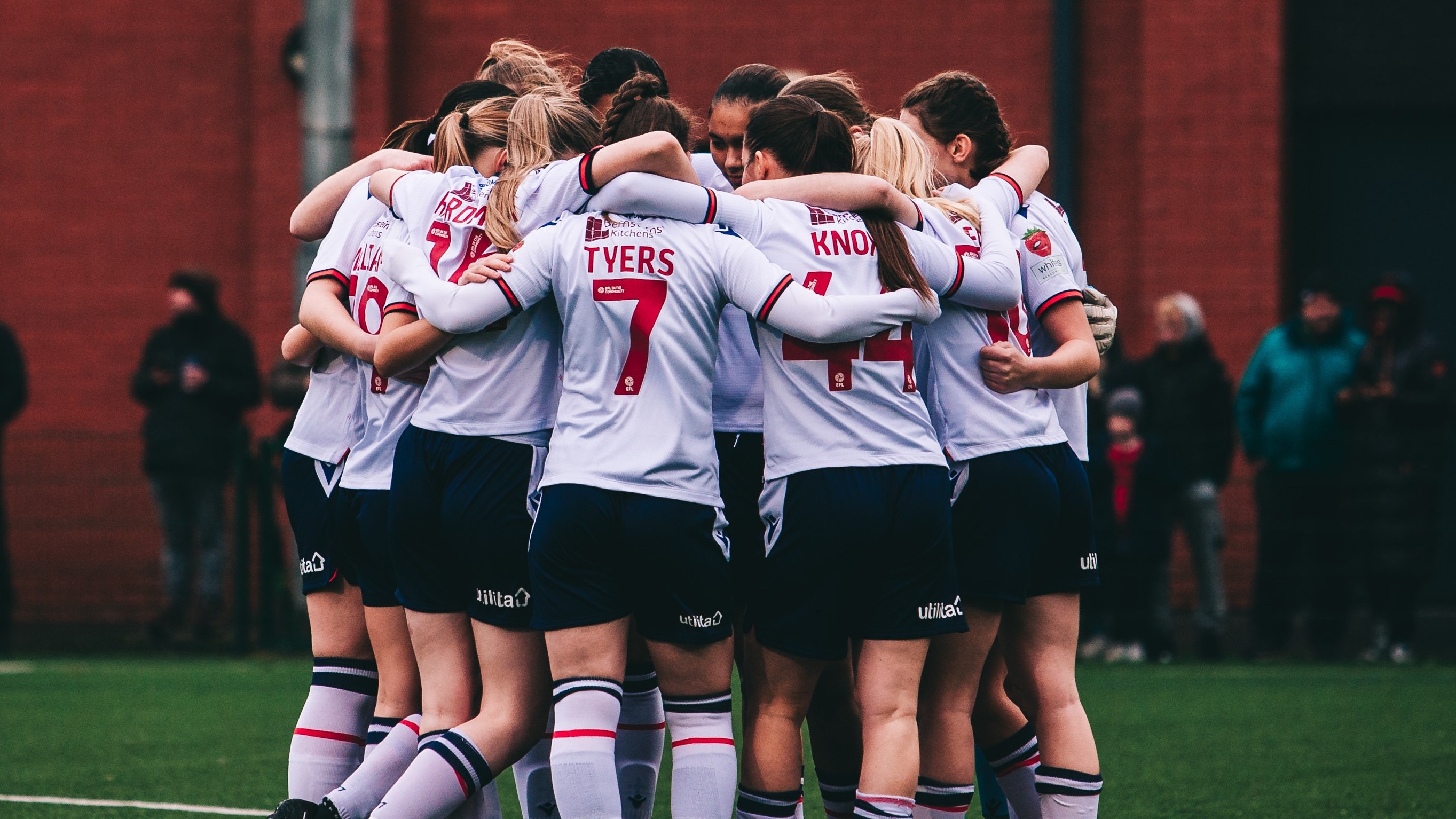 Women's Team Huddle