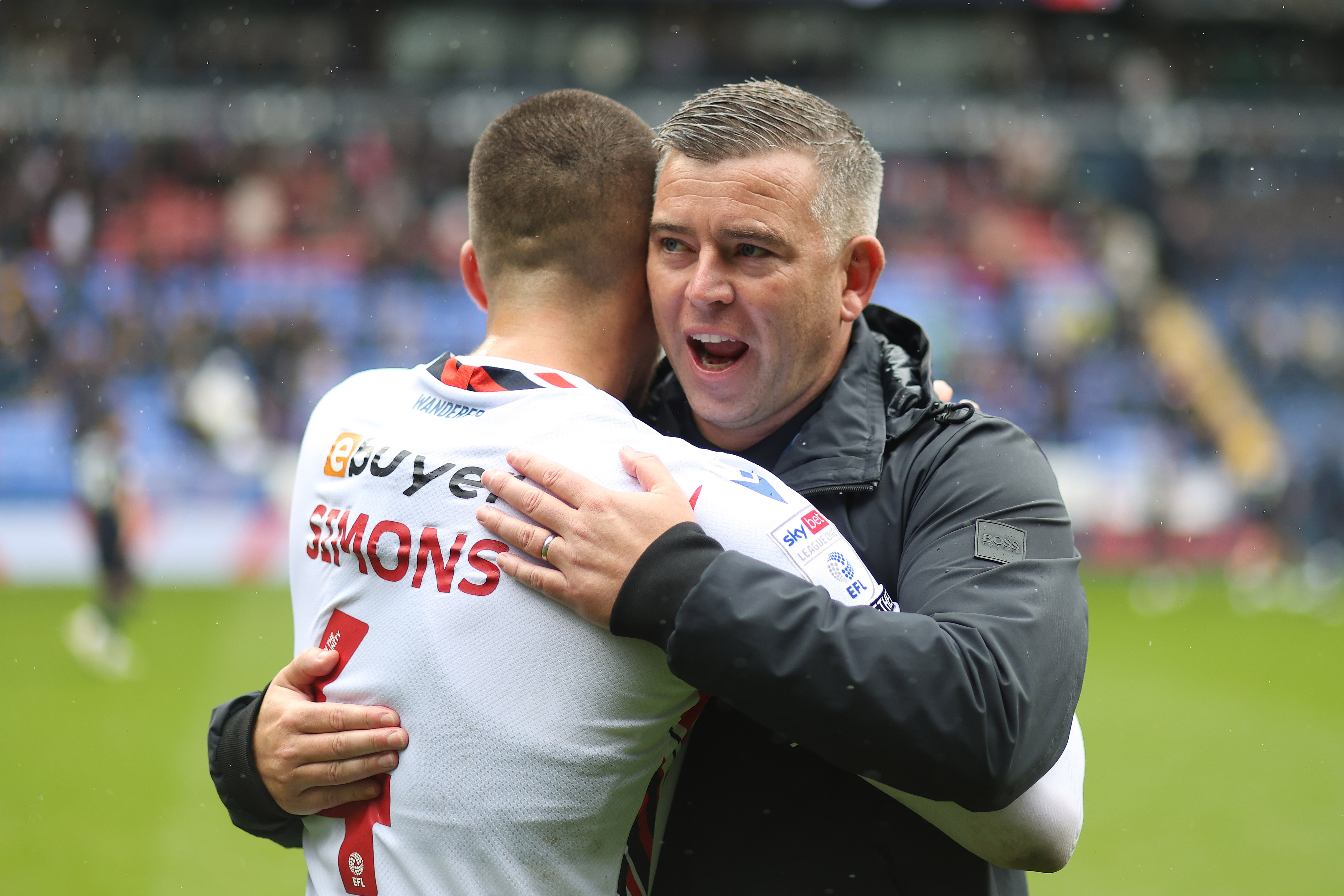 Schumacher Simons hug Wigan