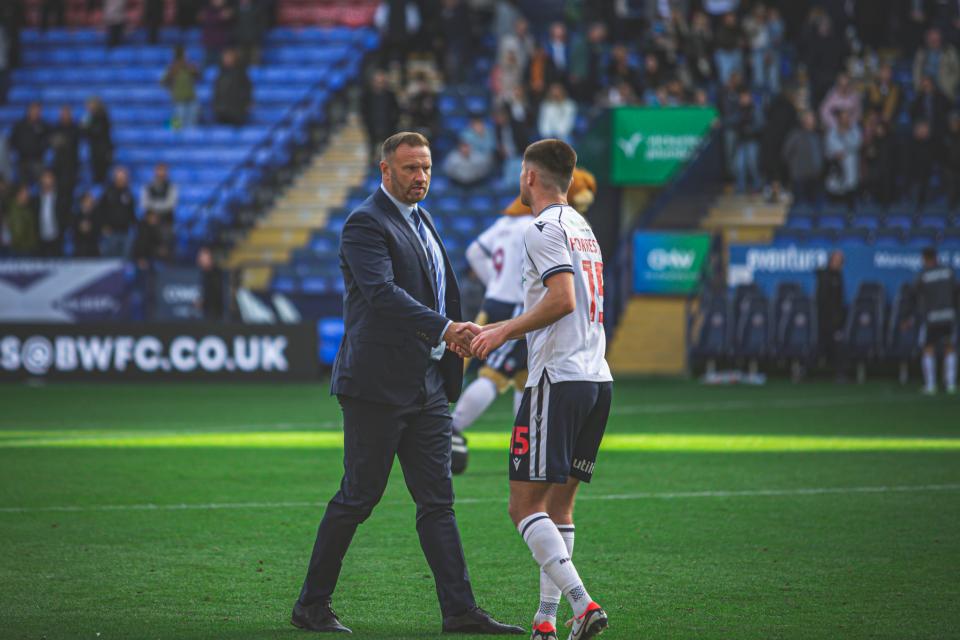 Evatt Forrester handshake