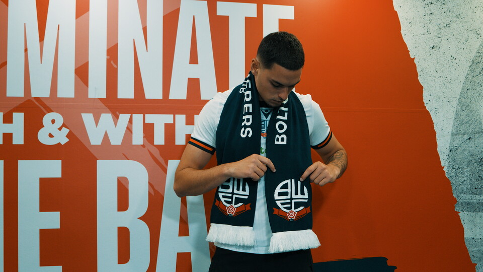 Klaidi Lolos signing scarf