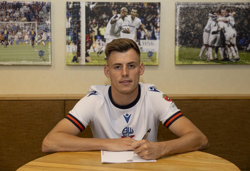 Schon signing smile