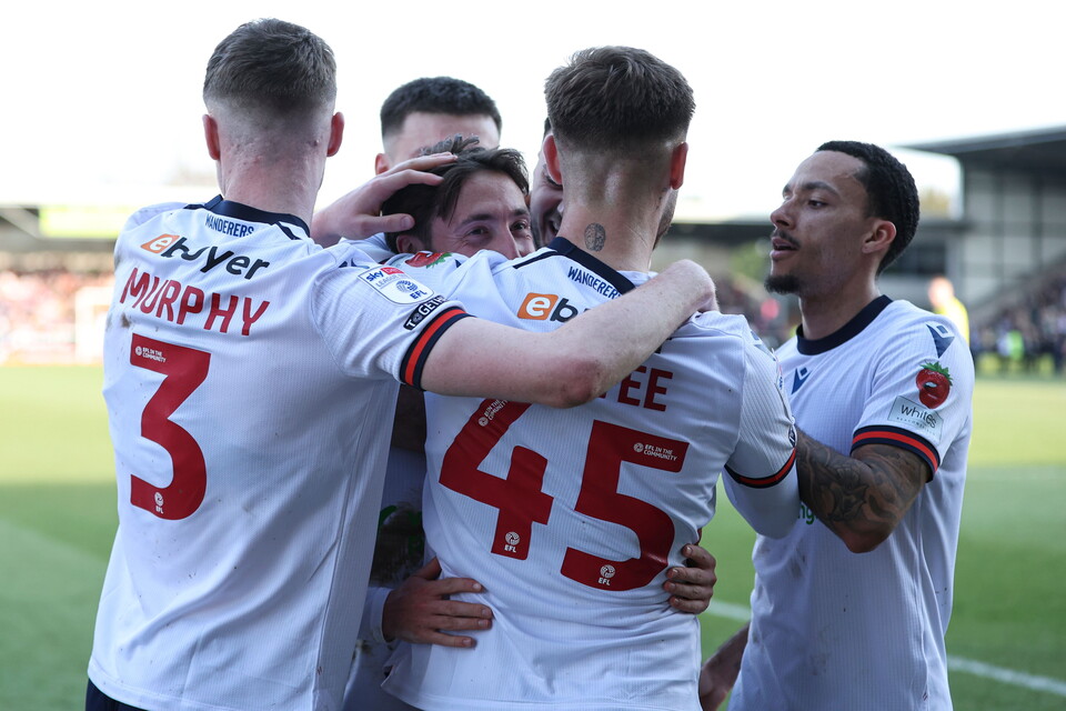 Players celebrating Josh Sheehan's goal versus Burton Albion