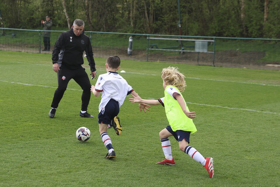 Steven Schumacher with two U8s at the Training Session