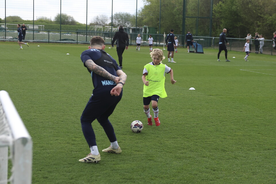 Gethin Jones and a U8 at the Training Session