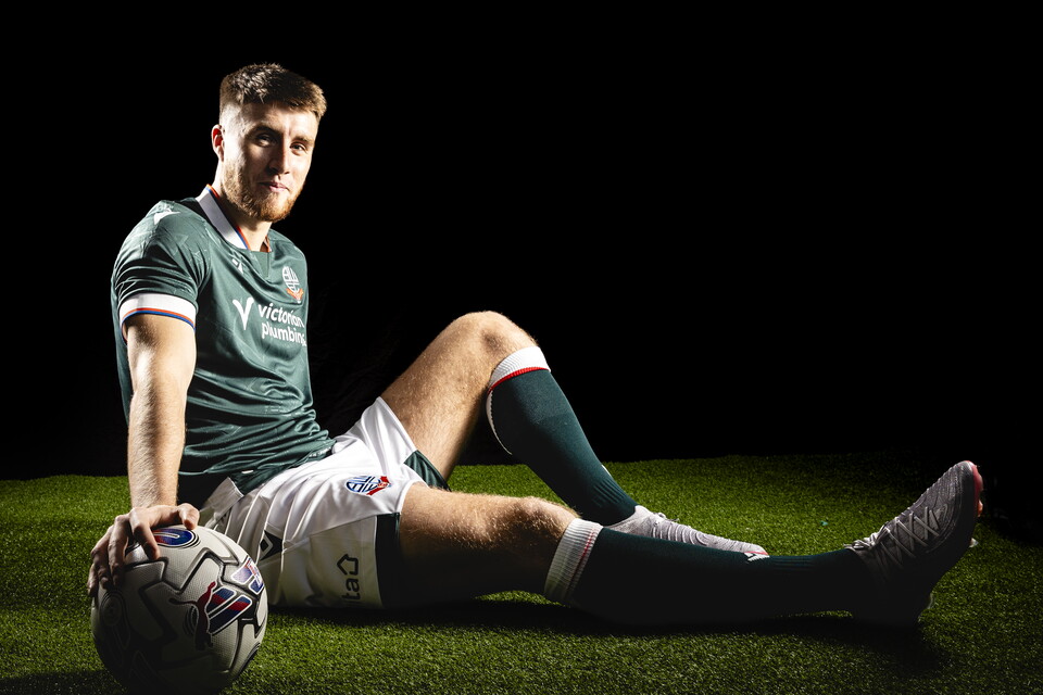 George Thomason in 24/25 away kit