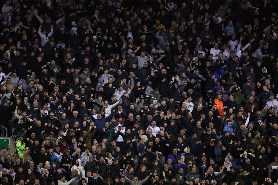 Fans celebrate Wigan