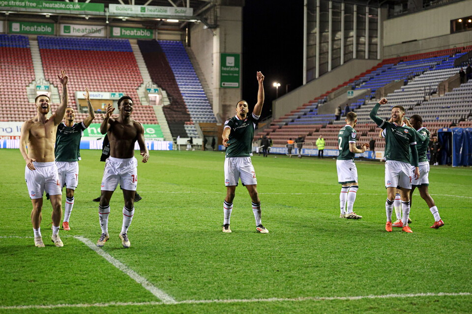 Forino and players celebrate Wigan