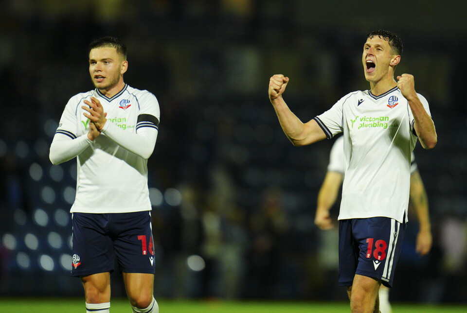 Eoin Toal and Aaron Morley celebrate at Wycombe away 2023