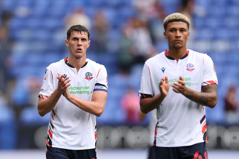 Eoin Toal and Mason Burstow applauding the fans following Lincoln draw