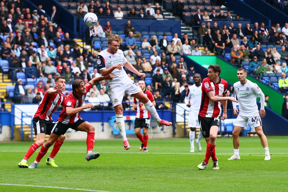 Sam Dalby header Lincoln