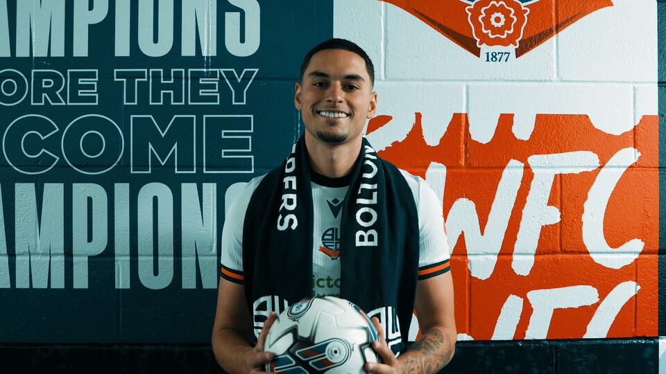 Klaidi Lolos signing ball