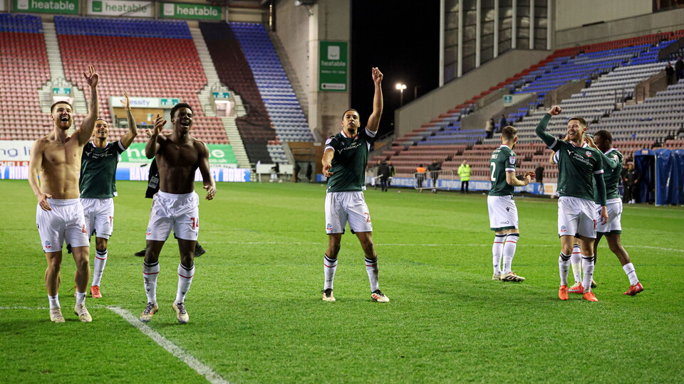 Forino and players celebrate Wigan