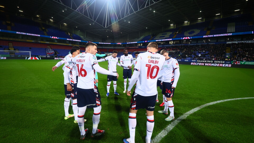 Player huddle Port Vale Trophy