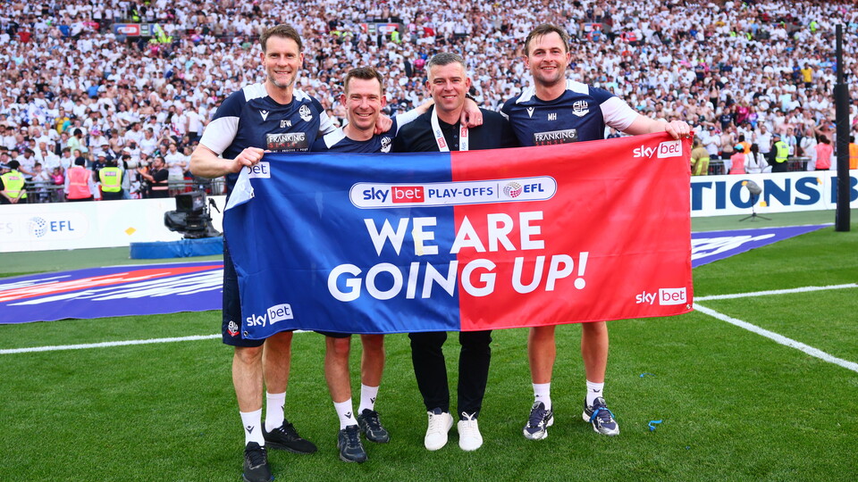 Staff celebrating Wembley
